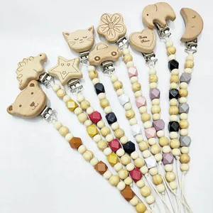 Image of High quality colorful safety baby teething toy silicone wooden clip pacifier chain