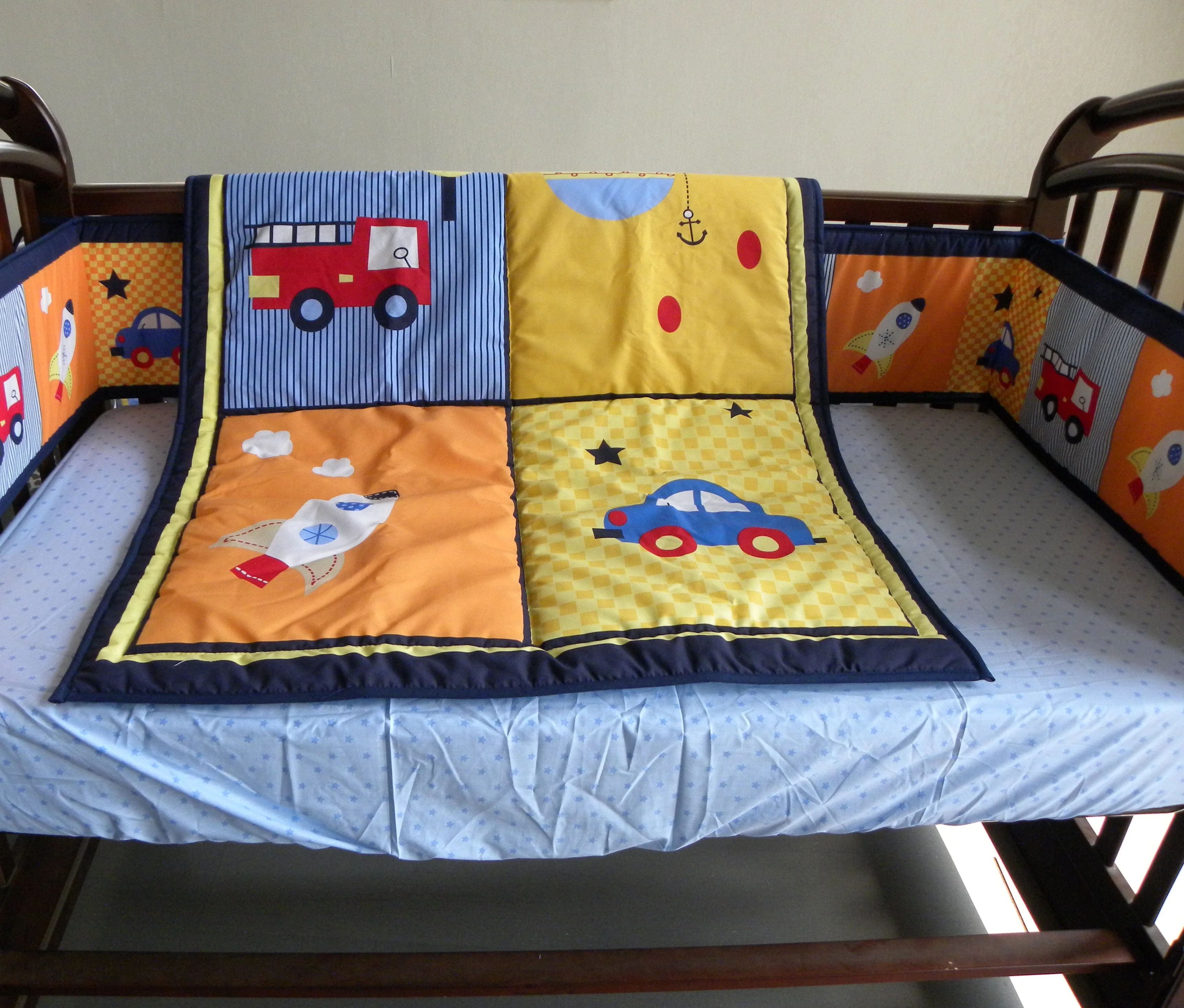 cot sheets and bumper sets