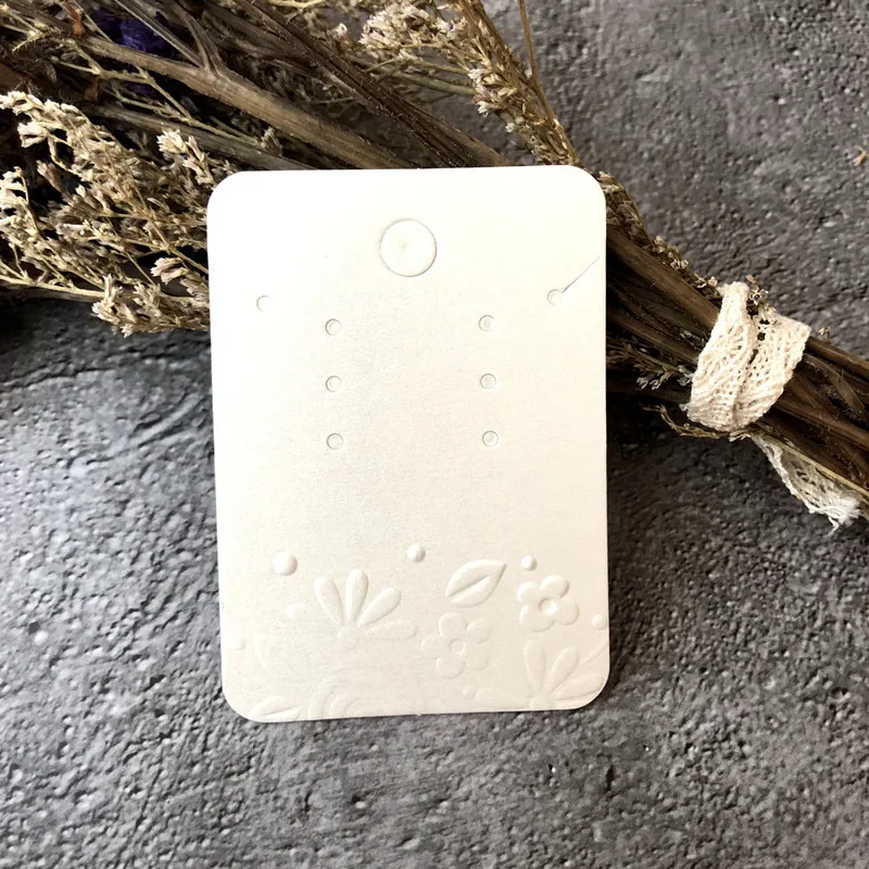 
Luxury White Pearl Paper Necklace And Stud Earring Packaging Hanging Card With Embossing Flower 