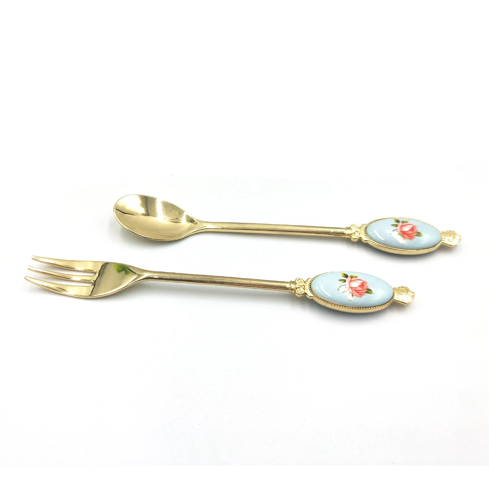 

Flower ceramic piece handle fork and knife set in gold