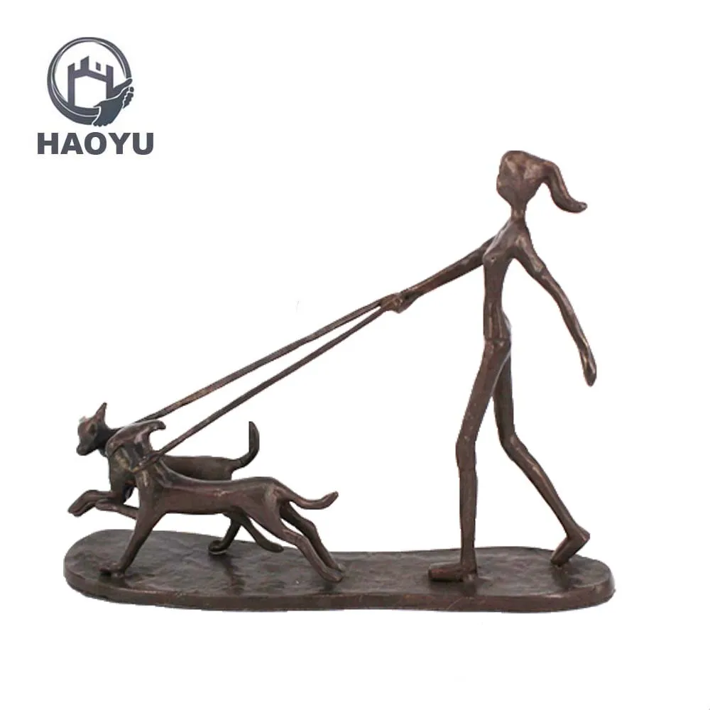 girl and dog statues