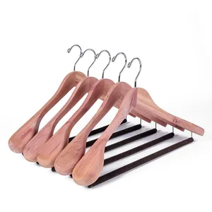 Image of Premium red cedar wooden coat hangers with wide shoulders luxury for closet