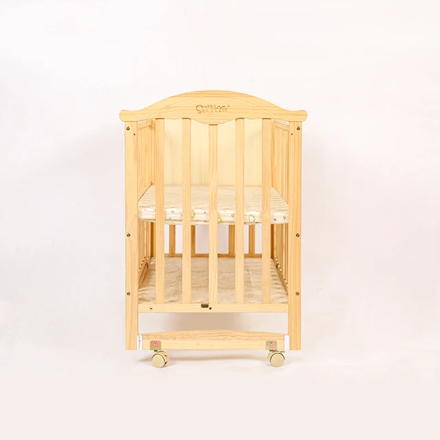 cot with adjustable side