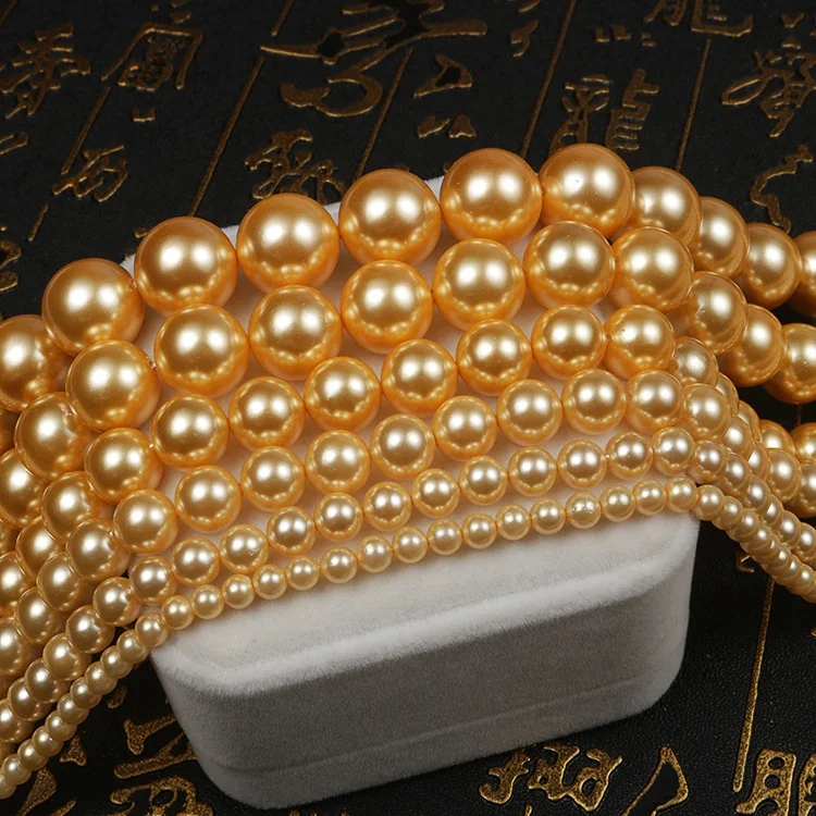 

gold pearl 3mm 4mm 6mm 8mm 10mm to 16mm round shape straight hole shell pearl for sale