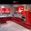 High gloss lacquer bright red kitchen furniture with built in ovens
