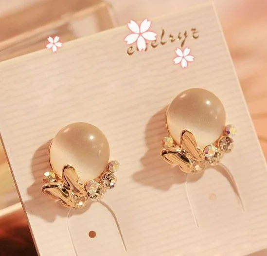 

2021 Korean edition of diamond-inlaid butterfly knot with bright cat's Eye Earrings for women
