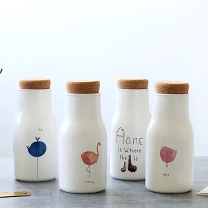 Image of Wholesale white ceramic milk bottle cork lid ceramic water bottle