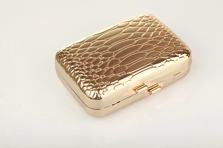 gold hard clutch bag