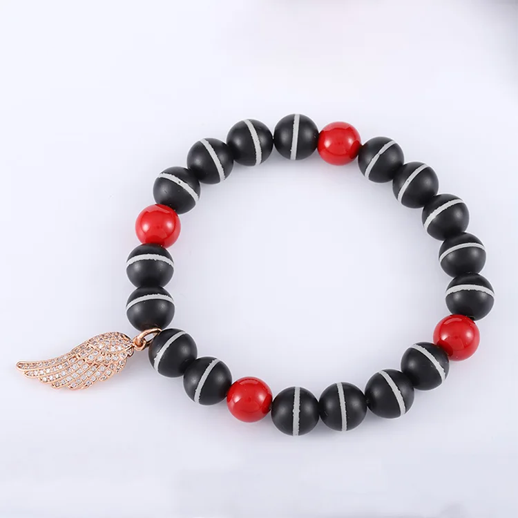 

Stars Forever Red Coral And Horizontal Black Bead Wing Charm Lady's Bead Bracelet, N/a