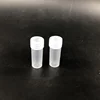 tiny plastic pill capsule bottle with cap