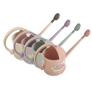 Image of eco - friendly indoor small garden plastic watering can