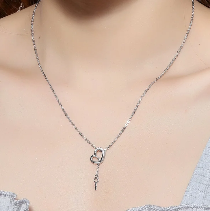 

New 925 sterling silver Korean sweet and temperament zircon heart tassel necklace women, 1 color