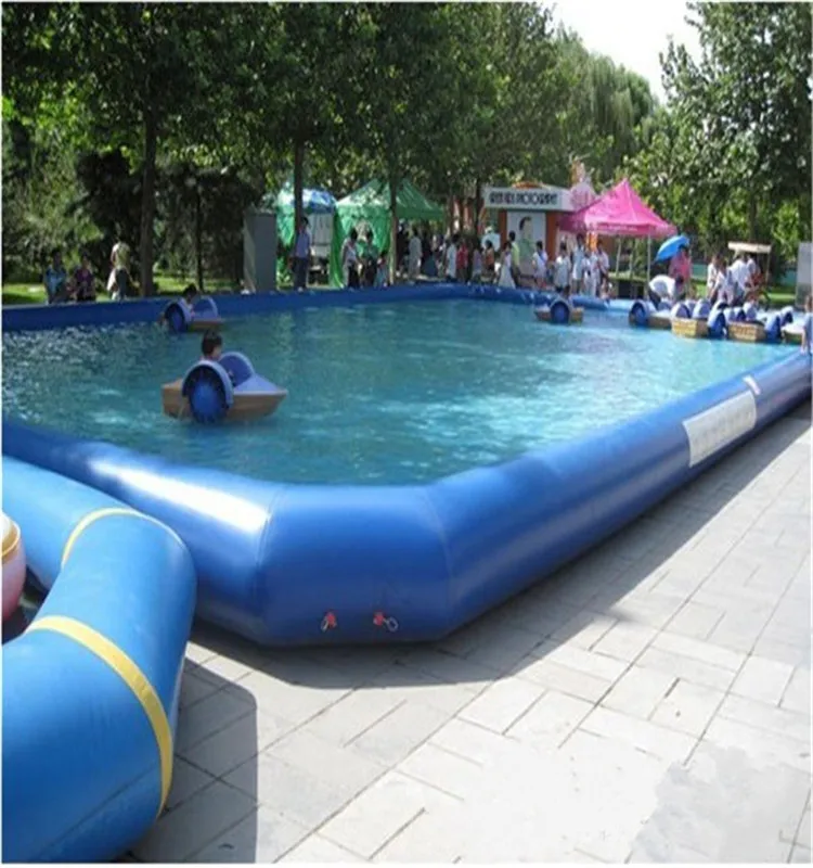 sc02.alicdn.com/kf/HTB1cpZ.XzDuK1RjSszdq6xGLpXa6/Guangzhou-Big-floating-inflatable-boat-swimming-pool.jpg