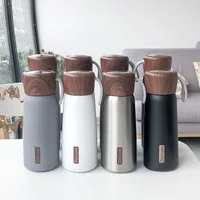 

Creative Wood Grain Cover Insulation Outdoor Portable Sports Stainless Steel Water Bottle