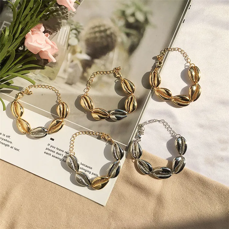 

AH-84500 /TRACYSGER/ Lady Bohemian cowry shell link bracelet