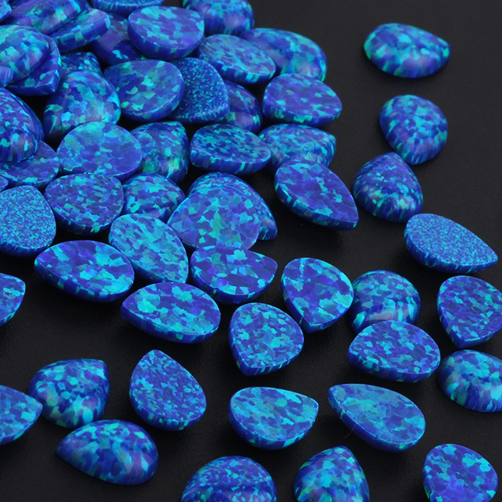 实验室创建 op27 深蓝色泪滴凸圆蛋白石石