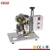 Semi automatic date coding machine onto bags