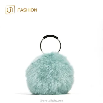 green faux fur bag