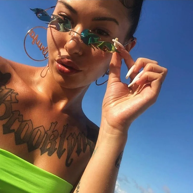 

Wholesale 2019 New Fashion Rimless Metal Frame Small Fire Shaped Designer Trendy Shades Sun Glasses Sunglasses Men Women 2020, Custom sunglasses