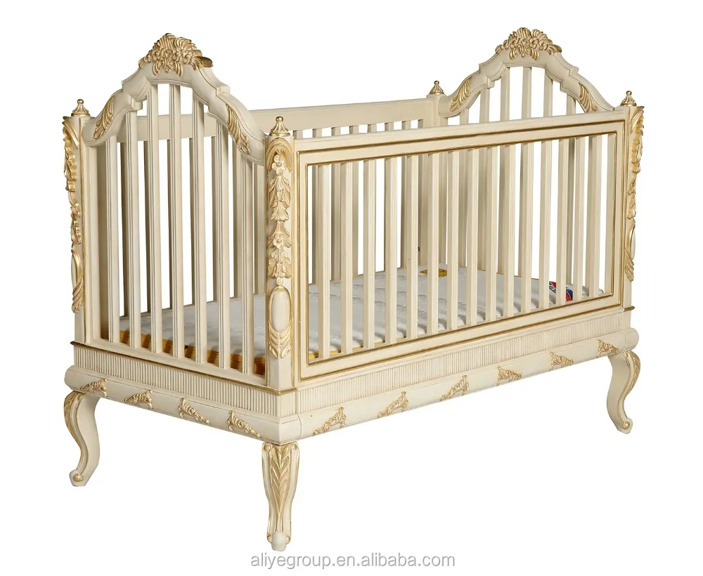baby sleeping wooden bed