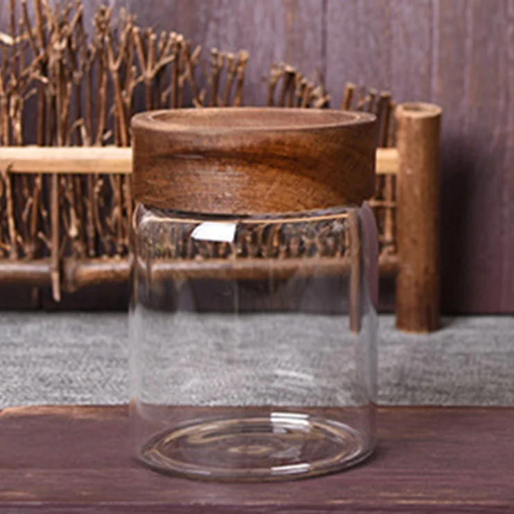 

Handblown small glass honey jar with screw wooden cap, Transparent