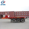 20ft/ 40ft flatbed type container transporting ending dumper 3 axles hydraulic tipping trailer