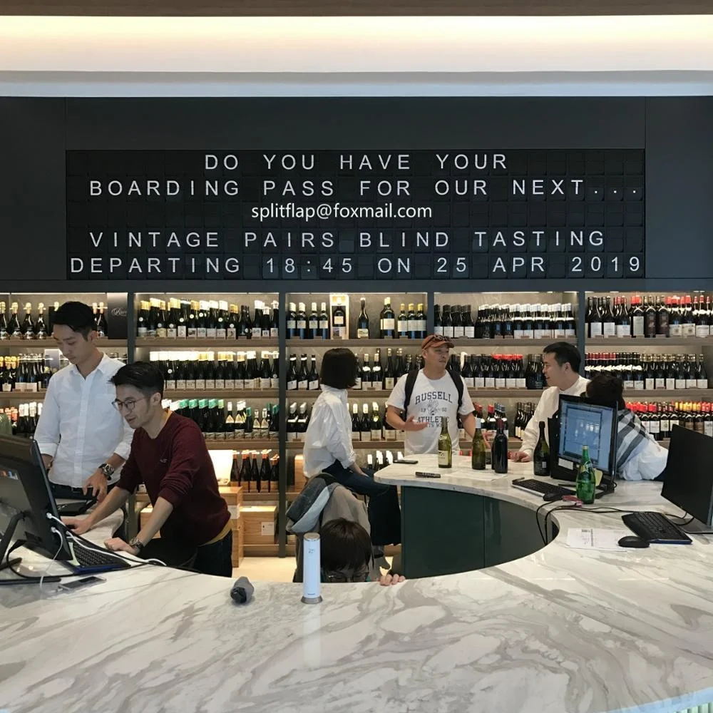 
split flap display board in a wine shop in hongkong 