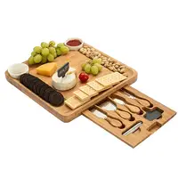 

Cheese bamboo Board With 4 Piece Stainless Steel Cutlery Set Charcuterie Board.