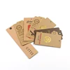 China Custom String Swing Cardboard Kraft Paper Emboss Hanging Price Brand Hang Tag for Garment Jean Shoe Clothing Jewelry