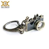 Key chain camera with antique brass plating
