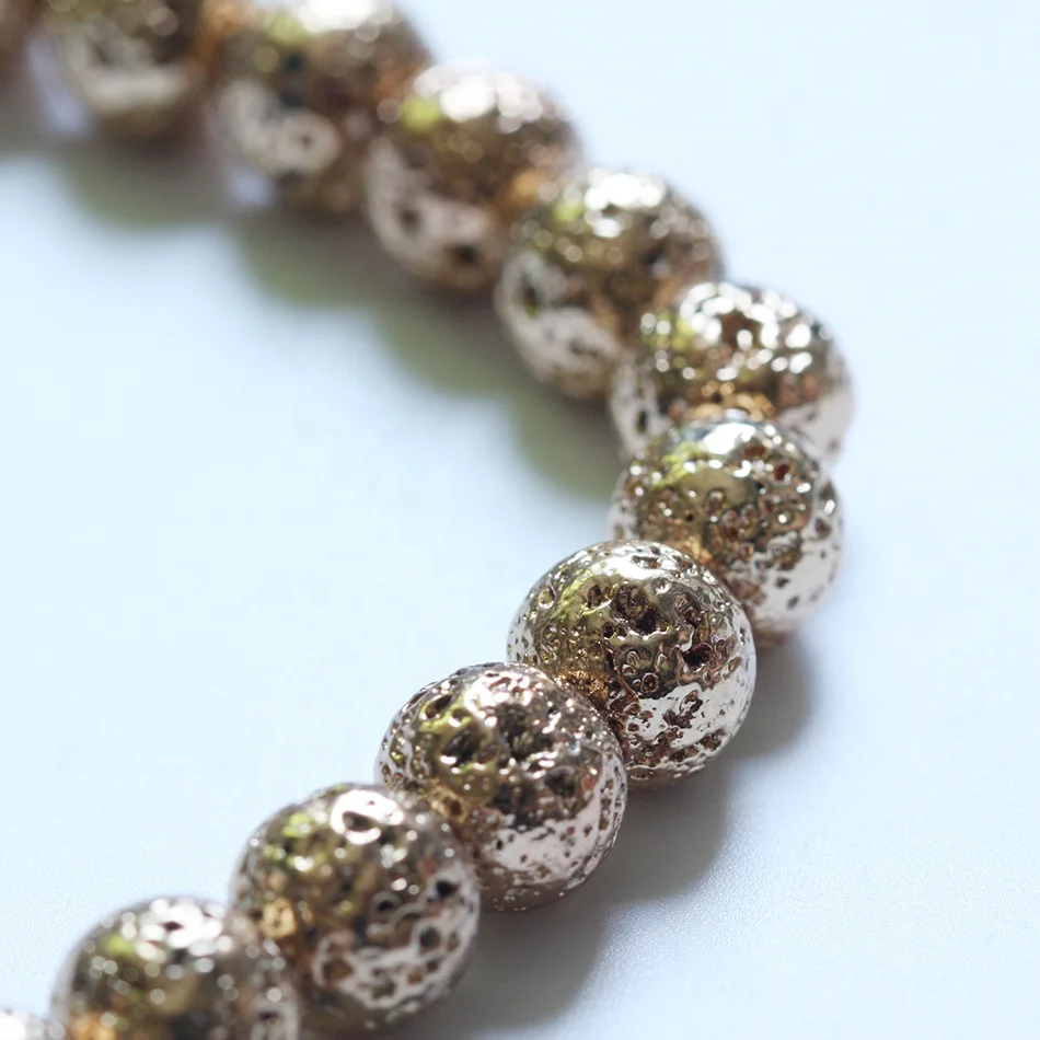 
Wholesale Top grade natural gemstone round beads 10mm Metallic Lava Rock Stone - Oxidized Silver - Gold Colored Lava Stone 