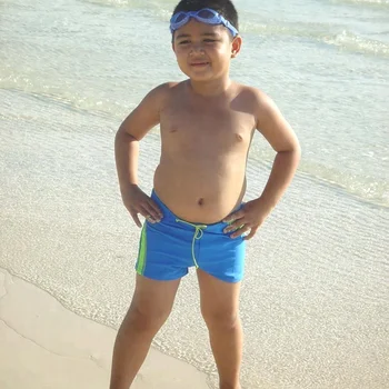 boy in swimming trunks