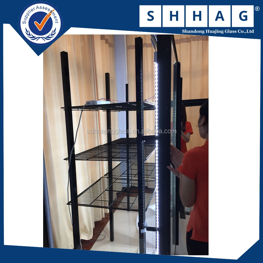 Freezer/cooler glass door in supermarket