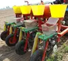 farm using machine for 3-row corn planter