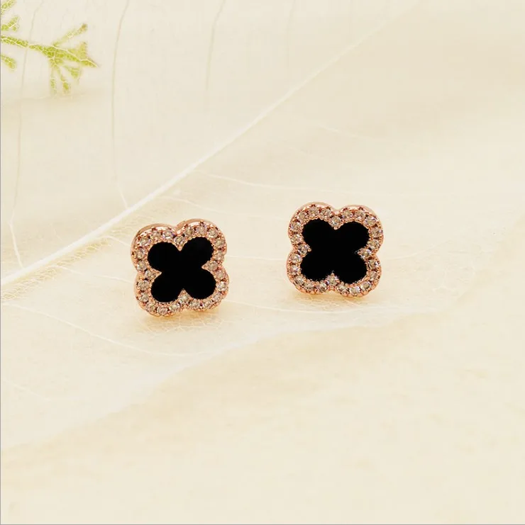 

European and American black four-leaf clover earrings full of zircon earrings
