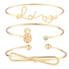 F09251G Fashion latest designs hot sale love pineapple knot gold color cuff bangle set