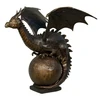 bronze water fountain dragon standing on the ball