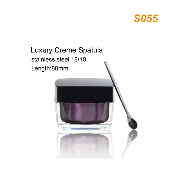 
Luxury silver stainless steel day cream spatula along with skincare cream jars 