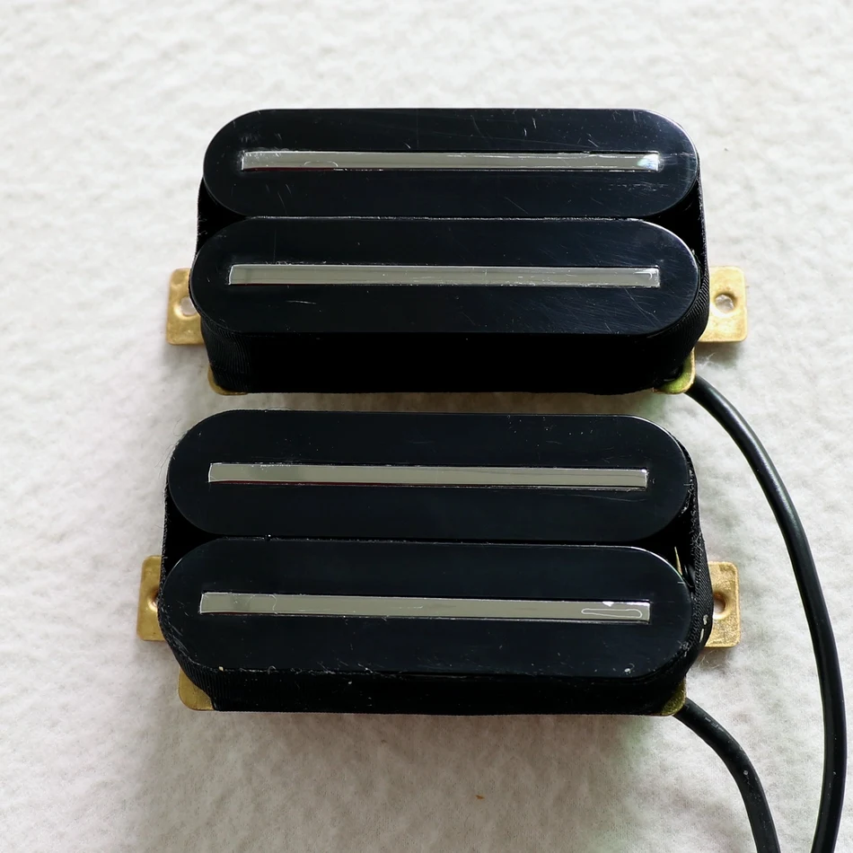

Electric Guitar Humbucker Pickup in black color with Dual chrome blades and 4 output wires and clear sound
