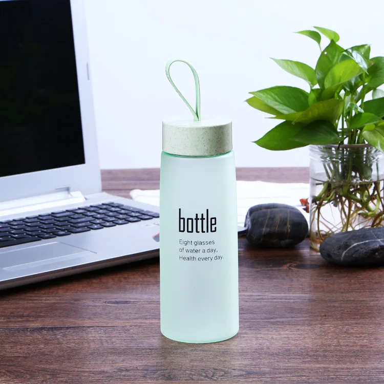 Eco-friendly 520ml frosted glass water bottle with rope water bottle wholesale
