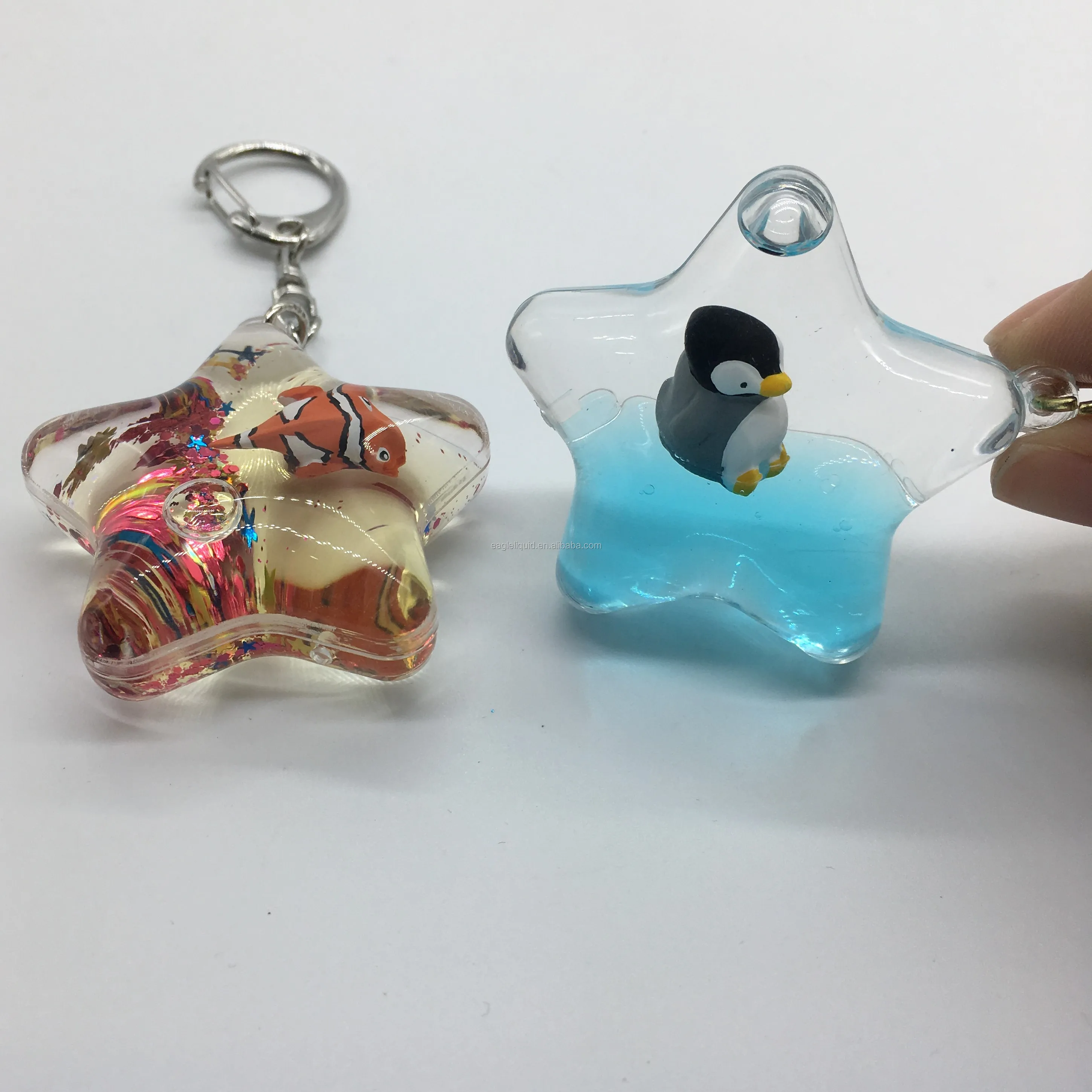 

Star-shaped liquid filled floating floater keychain newest novelty water keyring