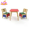 Wholesale cheap colored 1 table 2 chair set wooden children study table and chair with storage function W08G237