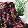 China hot sell burnout flower pattern polyester and spandex blended fabric for garment
