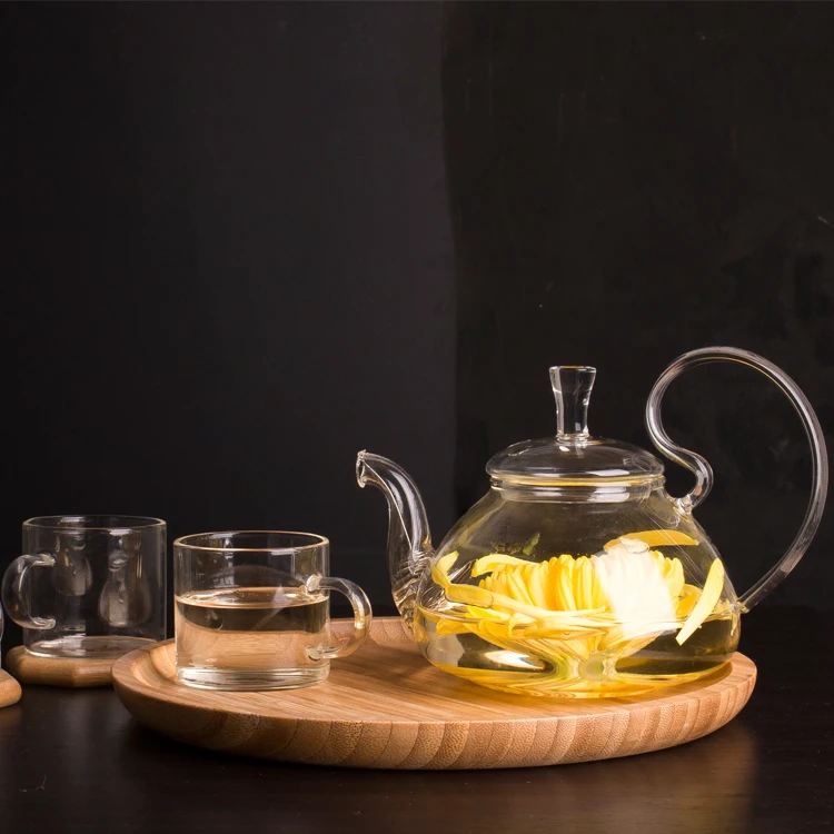 

600ml fire resistant cheap glass flower tea teapot with warmer, Transparent