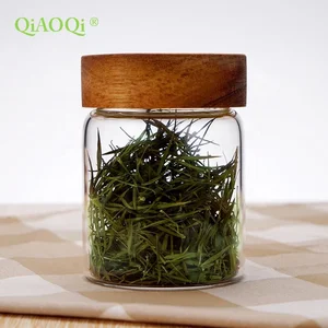 Image of QiAOQi High borosilicate sealed small flowers tea storage glass jars with wooden lid