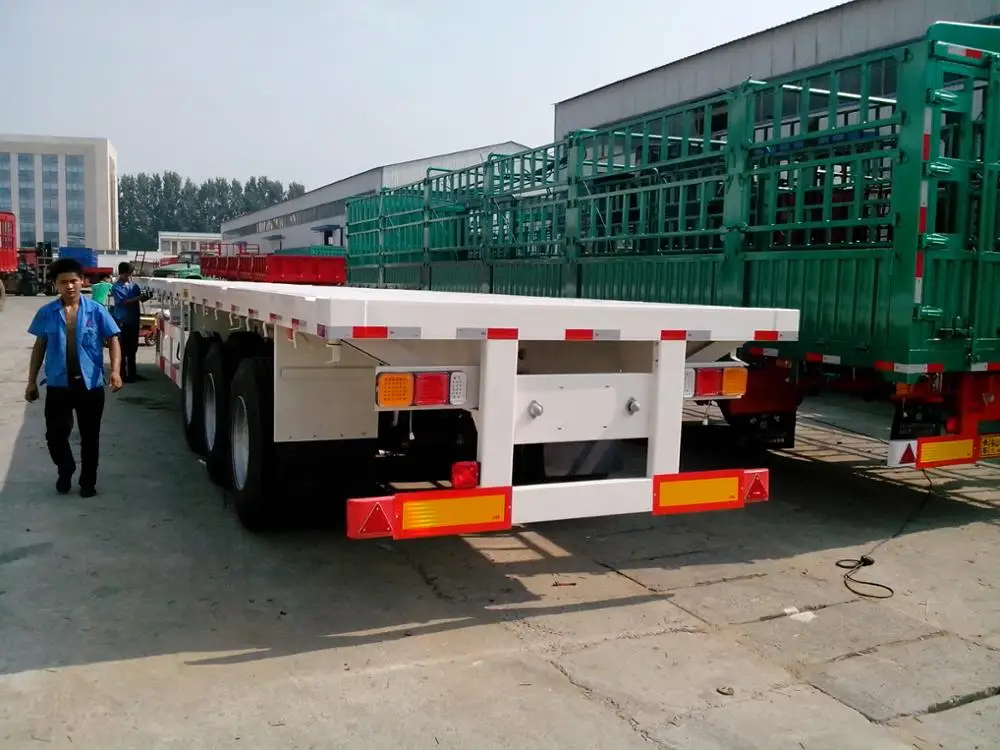 3 axle flatbed side wall semi truck trailer and 6x4 Sinotruk tractor truck