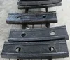 Crusher plate and hammer with Mn-casting