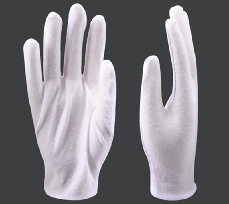 

White cotton knitted disposable working glove
