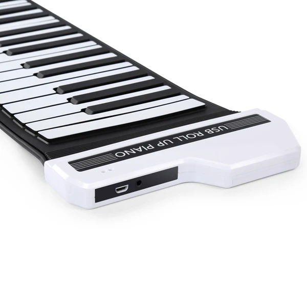 white roll-up piano.jpg