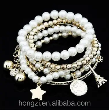 

Multi-element Eiffel Tower pearl vintage bracelet coin six pieces of jewelry multi-layer elastic bracee layers of pearl bracelet